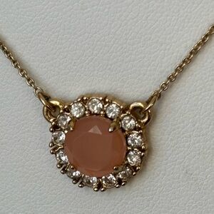 Kate Spade pink pendant necklace/ round with rhinestones around edges